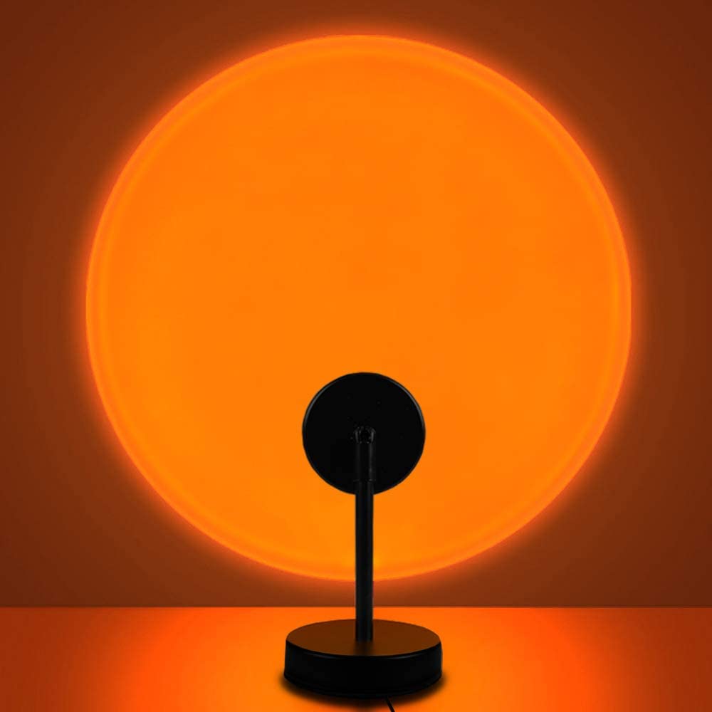 Modern sunset lamp projector creating a warm, aesthetic glow, perfect for home decor, photography, and ambient lighting.